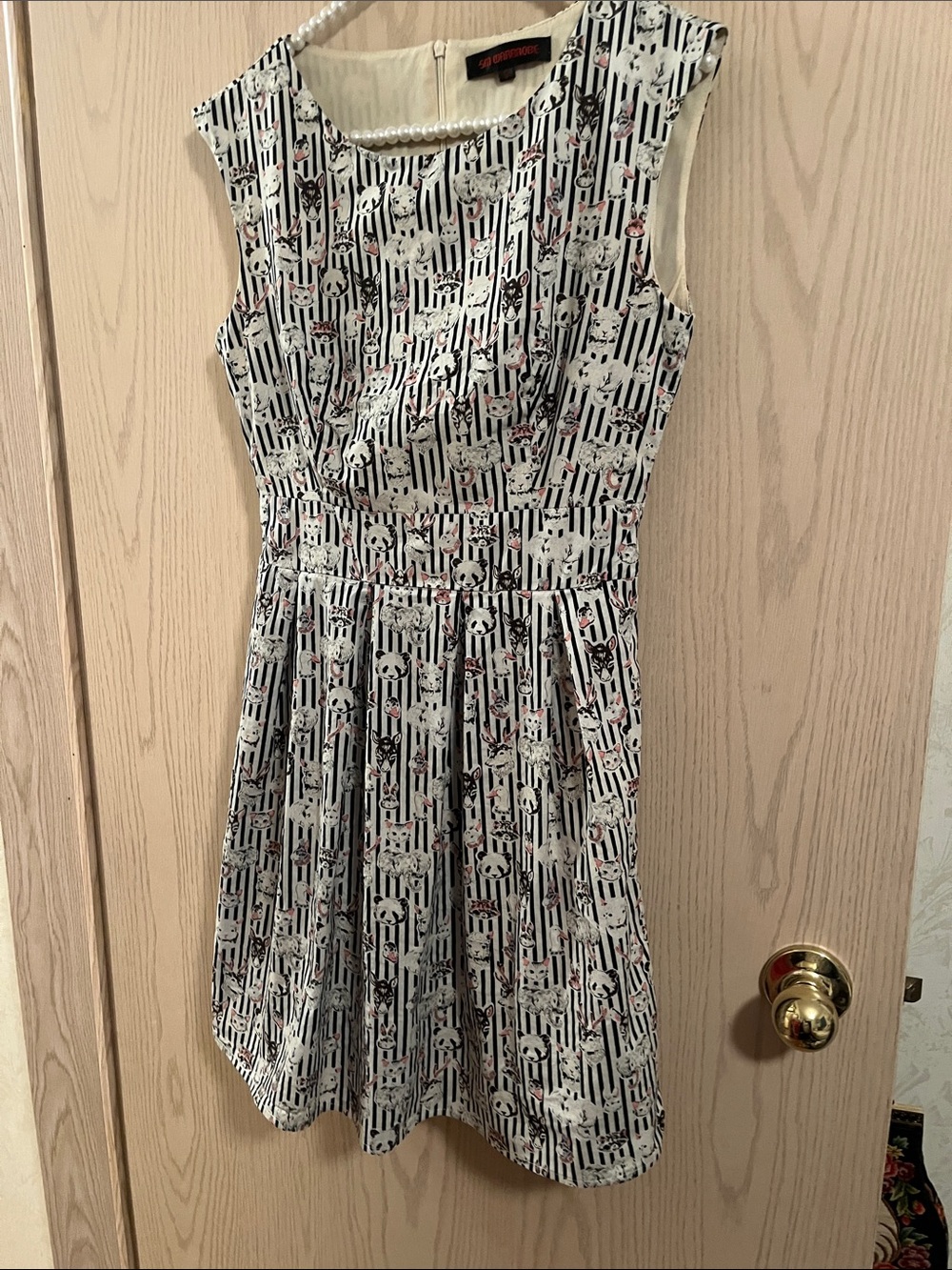 Sleeveless Black and White Floral-Striped Fit & Flare Mini Dress
